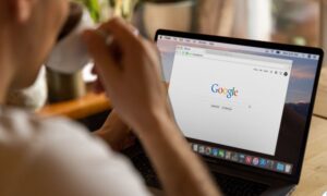person searching for google my business Houston on a laptop
