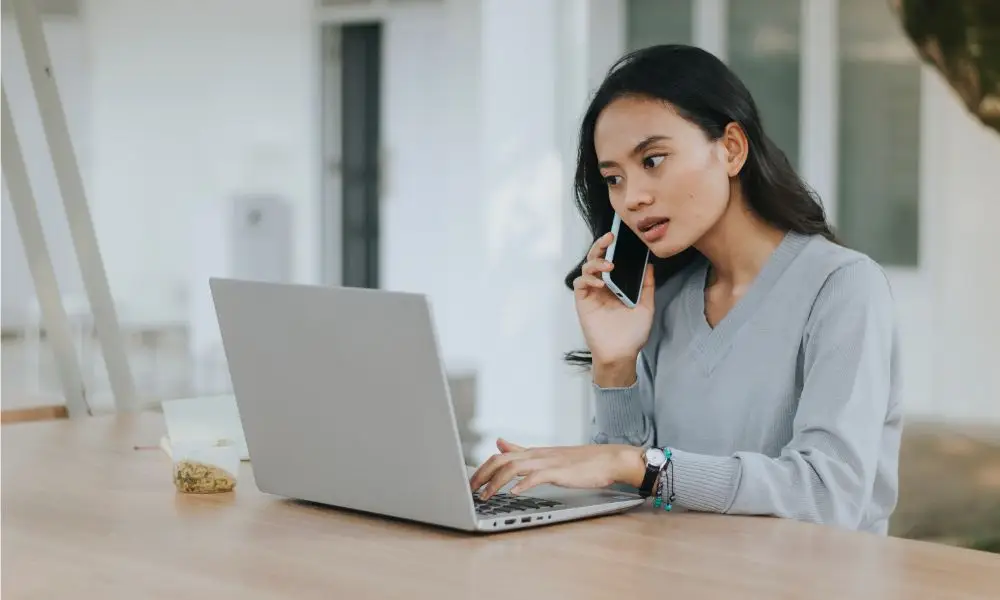woman calling HVAC company for service due to social media marketing