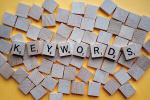 scrabble letters spelling out "keywords" for keyword use from your digital marketing agency